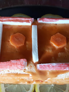 Una foto de Pastel de cangrejo y gambas