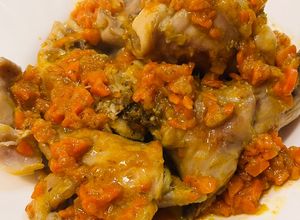 Foto di Coniglio alla birra con carote e cipolla