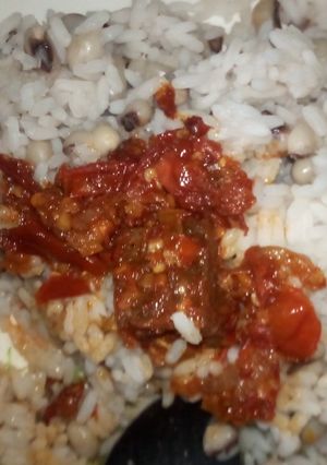 A picture of Rice and beans with awara sauce.