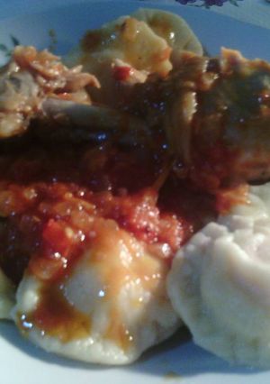 Una foto de Sorrentinos de jamón y muzzarella con salsa de pollo