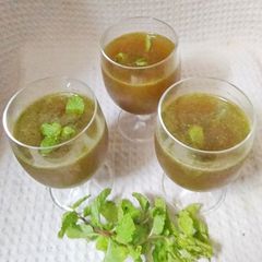 A picture of Jaggery and mint sharbat.
