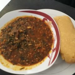 A picture of Okro soup with eba.