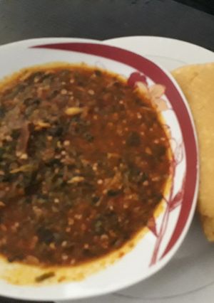 A picture of Okro soup with eba.