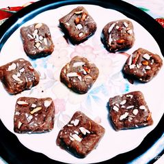 A picture of Yummy tasty copra banana dry fruit Burfi.
