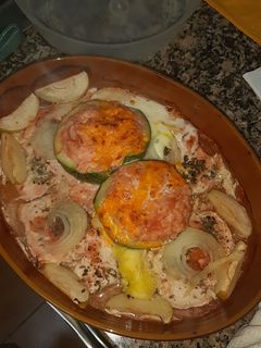 Una foto de Calabacín relleno de arroz con pechugas de pollo