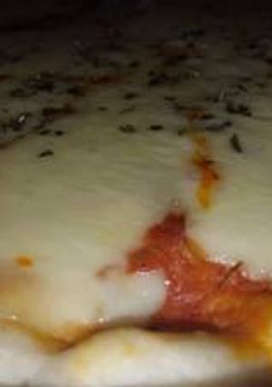 Una foto de Pizza casera ciento por ciento