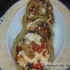 A picture of Peppers and olive mini pies.