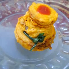 A picture of Stuffed onion pokara.