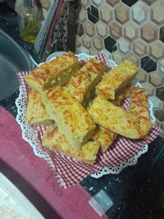 Una foto de Budín salado de queso y cebollín