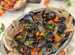 Foto di Cozze alla marinara con pomodorini