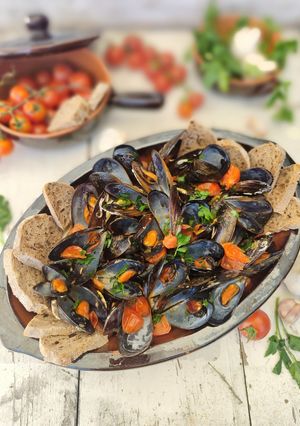 Foto di Cozze alla marinara con pomodorini