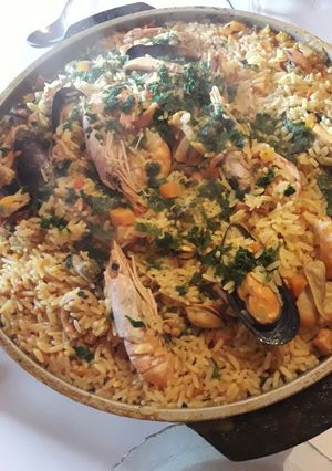 Una foto de Paella