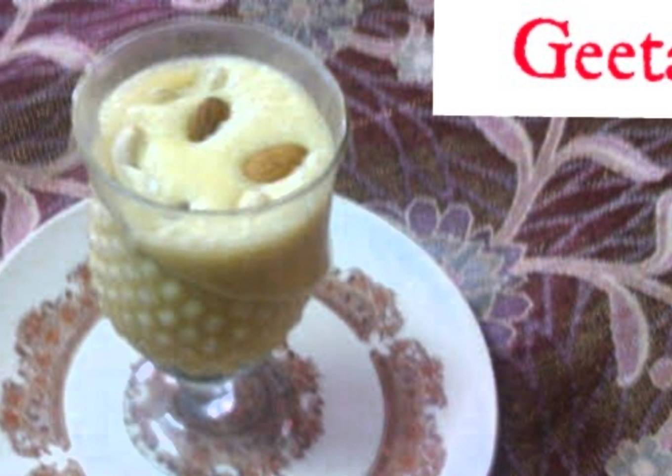 Mango shake with ice cream and dry fruits