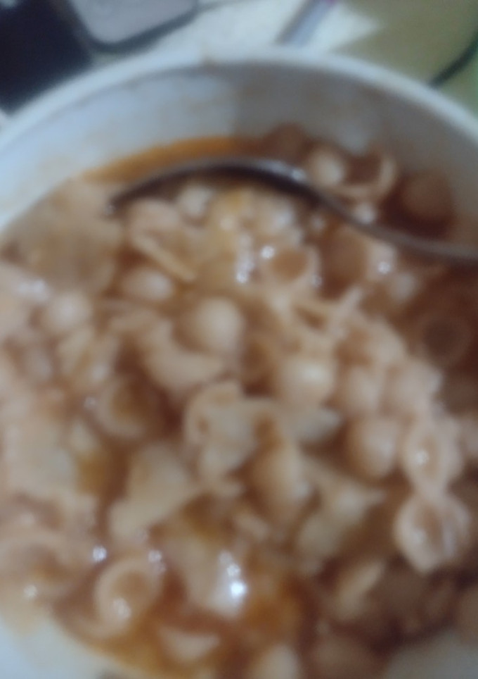 Una foto de Sopa de caracol #1 con jitomate natural 🍅y con puré de tomate🍅