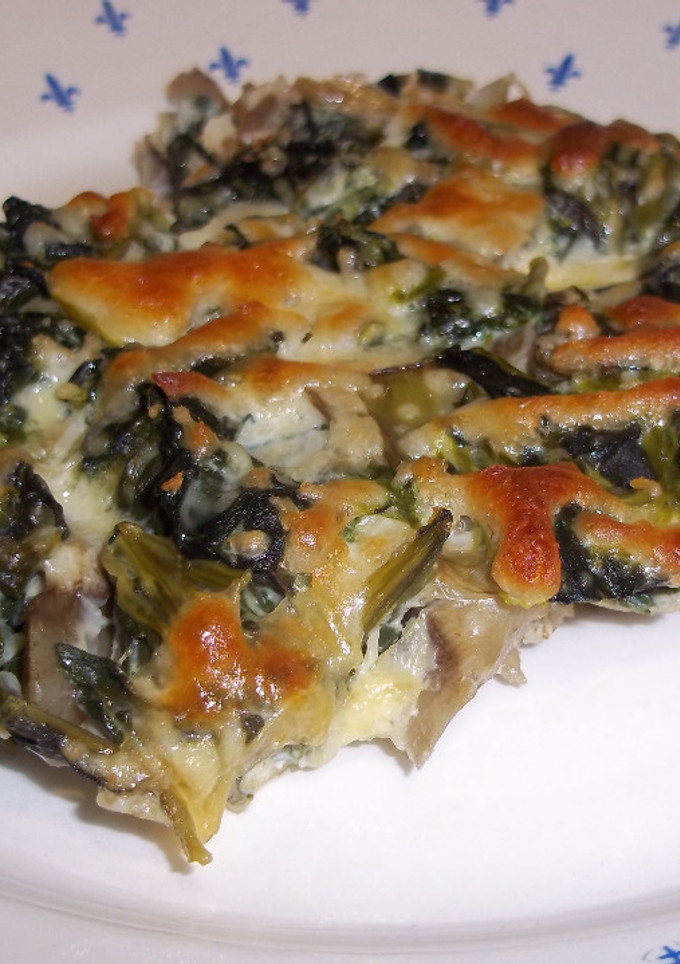 Una foto de Pastel de espinacas y alcachofas gratinado