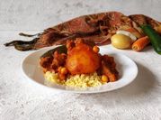 Una foto di cous cous con carne
