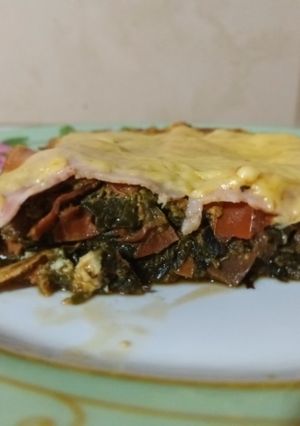 Una foto de Pizza de acelga 😋😉