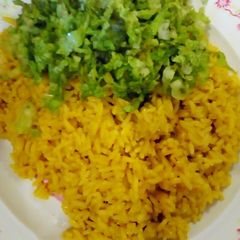 A picture of Rice with lettuce.