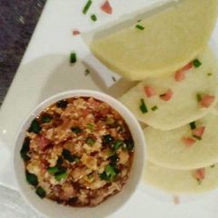A picture of Boiled yam with egg sauce.