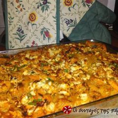 A picture of Spaghetti with shrimps in the oven.