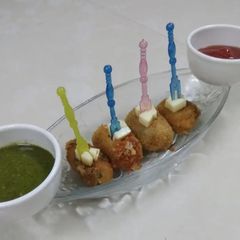 A picture of Cheese nuggets.