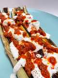 Puerros asados con burrata y sobrasada
