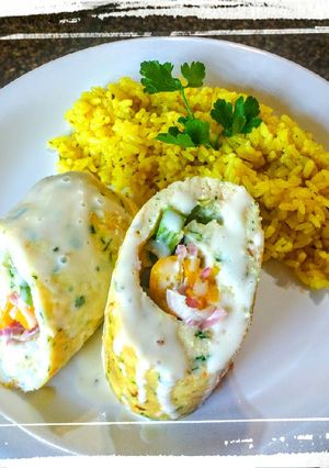 Una foto de Roll de Surubí con Salsa Cítrica y Arroz Saborizado