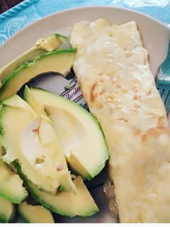 A picture of Fried egg with avacado.