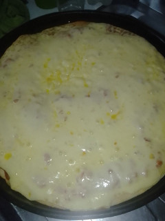 Una foto de Pizza con muzarella