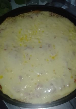 Una foto de Pizza con muzarella
