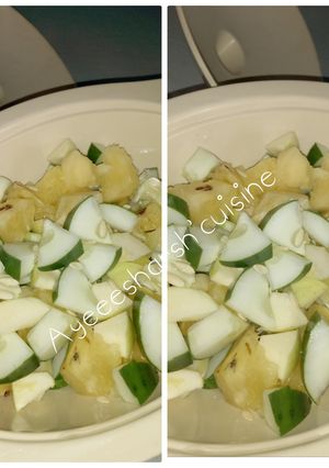 A picture of Apple,pineapple and cucumber fruit salad.