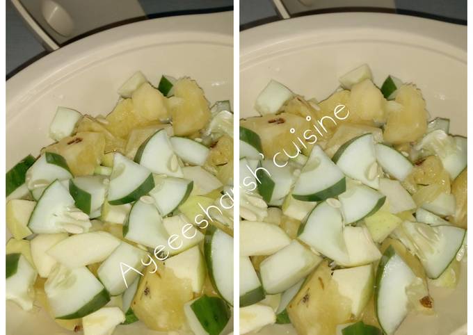 Apple,pineapple and cucumber fruit salad