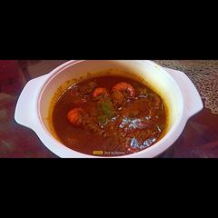 A picture of Shorshe Chingri (Mustard Prawn).