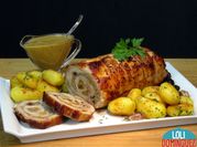 Una foto de lomo de cerdo horno con patata