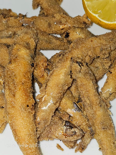 Una foto de Boquerones adobados fritos