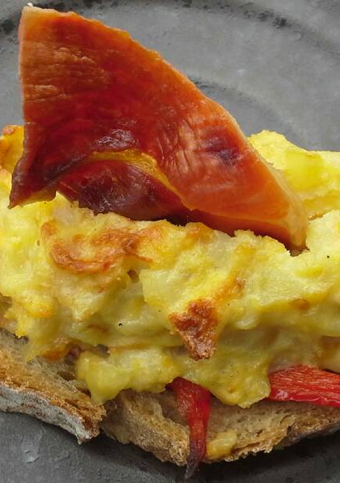 Una foto de Crema de tortilla con jamón