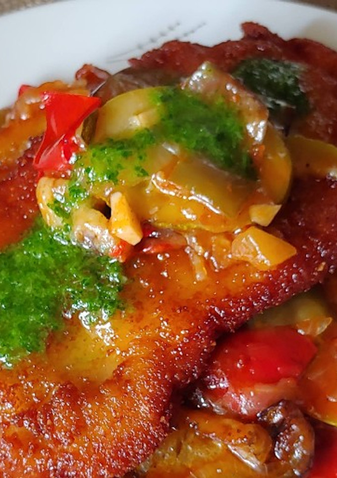 Una foto de Pollo milanesa con tumbet