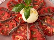 Una foto de aperitivo con anchoa
