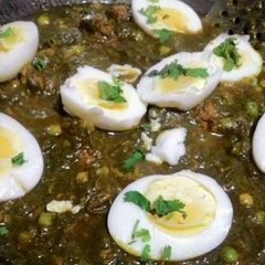 A picture of Palak with Boiled Eggs.