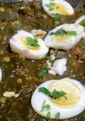 A picture of Palak with Boiled Eggs.