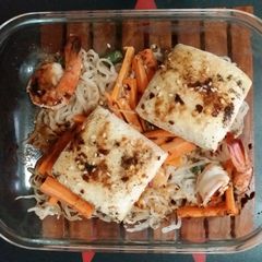 A picture of Shirataki noodles with tofu and shrimp.