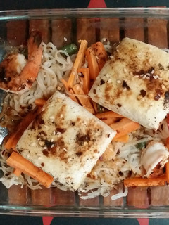 A picture of Shirataki noodles with tofu and shrimp.