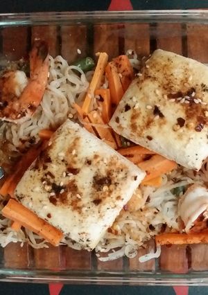 A picture of Shirataki noodles with tofu and shrimp.