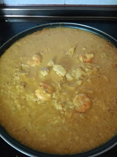 Una foto de Risotto de atún y gambas