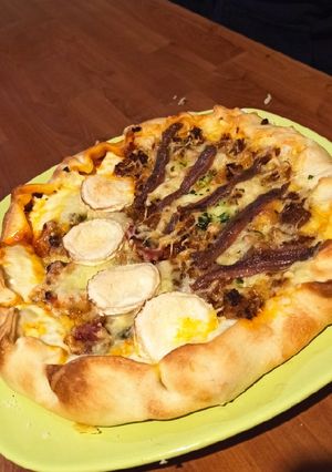 Une photo de Pizza double saveur fait maison