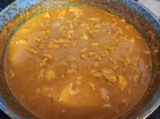 Una foto de chicken tikka masala