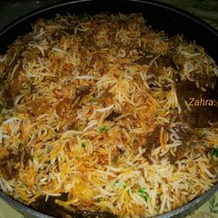 A picture of Kachhe Gosht ki Biryani.