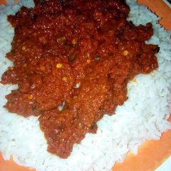 A picture of White rice wit stew.