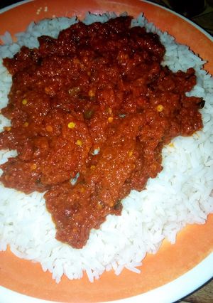 A picture of White rice wit stew.
