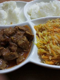 A picture of Ugali beef/cabbages.